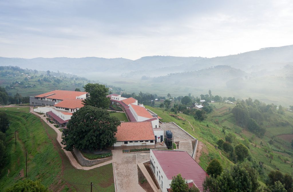 Butaro Hospital aerial view from above, with mountains in the background